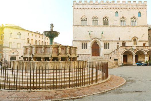 Perugia main square Piazza IV Novembre with Old Town Hall and monumental fountain Fontana Maggiore, Umbria, Italy.