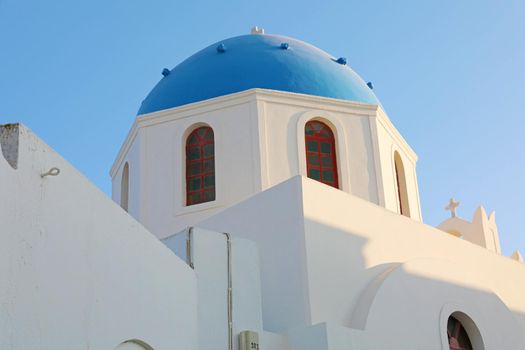 Oia church with cupola painted blue, Santorini, Greece