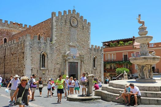 TAORMINA, ITALY - JUNE 20, 2019: Cathedral of Taormina town and fountain of Piazza Duomo square