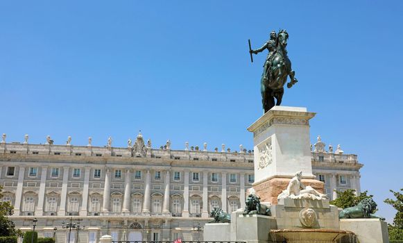 Monument to Philip IV of Spain with Royal Palace of Madrid on th