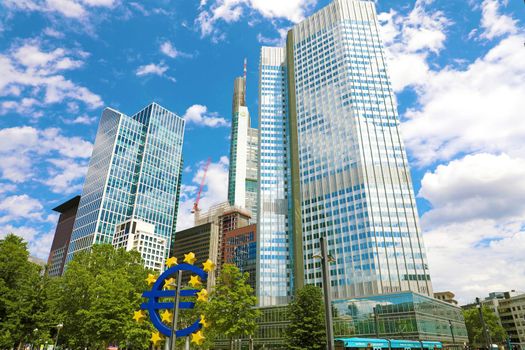 FRANKFURT, GERMANY - JUNE 13, 2019: business and finance concept with giant Euro sign at European Central Bank headquarters in the morning, business district in Frankfurt am Main, Germany