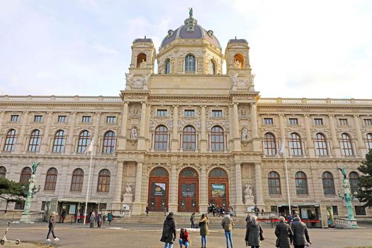 VIENNA, AUSTRIA - JANUARY 2019: tourists visiting Kunsthistorisches Museum (Art History Museum) in Marie-Theresien Platz square in Vienna, Austria