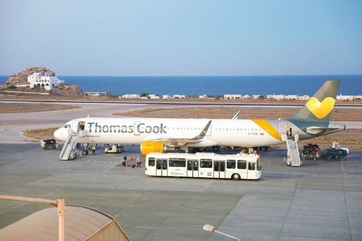 SANTORINI, GREECE - JULY 2018: Thomas Cook airplane in Santorini airport, Greece