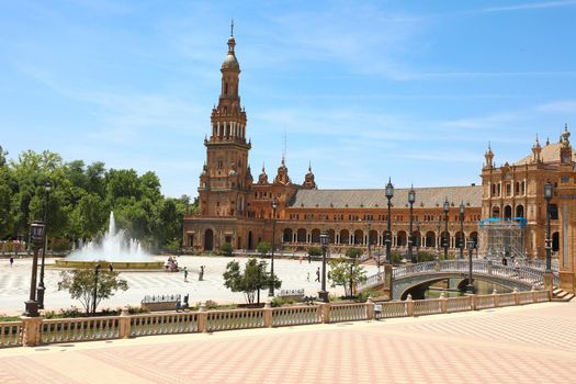 SEVILLE, SPAIN - JUNE 14, 2018: Spain Square (Plaza de Espana) in Seville, built on 1928, it is one example of the Regionalism Architecture mixing Renaissance and Moorish styles