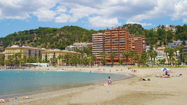 MALAGA, SPAIN, JUNE 13, 2018: beautiful view of Malaga beach with blue sky and white clouds, Spain  