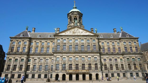 AMSTERDAM, NETHERLANDS - JUNE 6, 2018: Royal Palace in Amsterdam on the Dam Square, Netherlands
