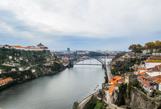 Aerial view of Porto, Portugal and metallic Dom Luis bridge over Douro river. November 2010