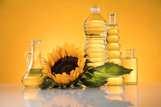 Bottles of sunflower oil with flower