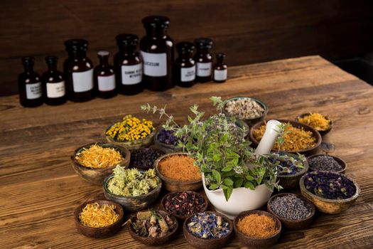 Natural medicine, wooden table background