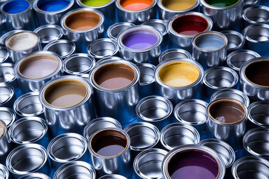 Group of tin metal cans with color paint