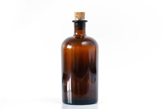 Brown apothecary glass bottle with cork stopper