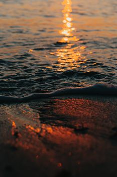 A close up of a tide during a sunset with super texture and colorful tones with copy space