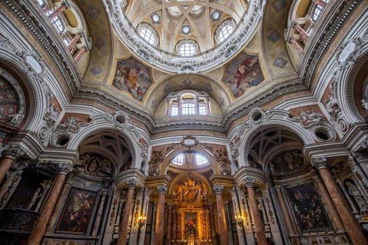 Antique baroque interior with vintage decoration. Royal Church of San Lorenzo (St. Lawrence) in Turin, Italy