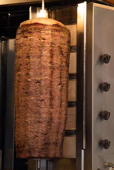 Traditional Turkish Doner Kebab kebab on skewer. Turkish cuisine street food 