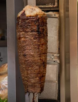 Traditional Turkish Doner Kebab kebab on skewer. Turkish cuisine street food 