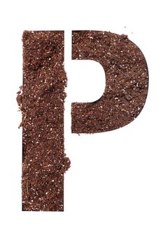 stencil letter P made above dirt on white surface