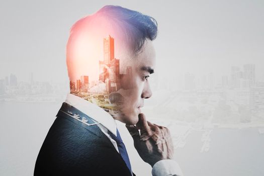 Double exposure of  businessman and city view concept