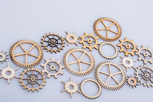 Gear wheels on white background as concept of engineering