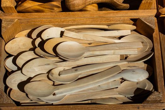 Handmade wooden kitchen utensils spoons for housewives. 