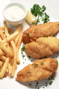 british traditional fish and chips meal on plate