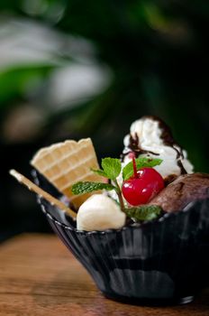 gourmet organic chocolate and strawberry ice cream sundae dessert