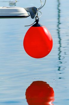 buoy hanging outside the hull of the boat, boat equipment