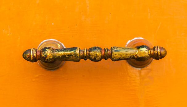 close up on a door handle with decorative elements, door decoration