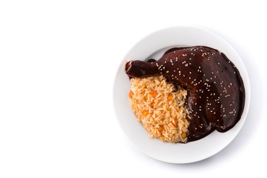 Traditional mole Poblano with rice in plate