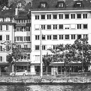 Vintage monochrome view of historic Old Town streets and buildings near main train station Zurich HB, Hauptbahnhof, Swiss architecture and travel destination in Zurich, Switzerland