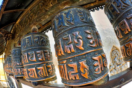 Tibetan copper prayer wheels, Swayambhunath Temple, Kathmandu, Nepal