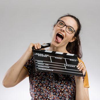Crazy woman with a clapboard