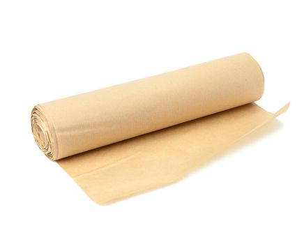 roll of brown parchment paper isolated on white background, for baking