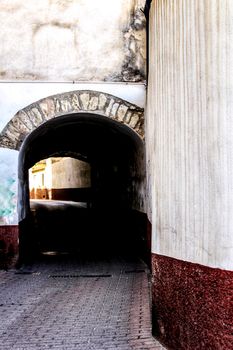 Narrow street with tunnel in Caravaca de la Cruz