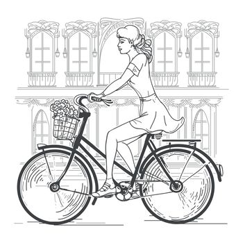 Girl bicyclist in Paris