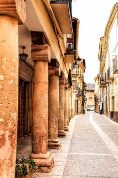 Majestic and old stone houses through the streets of Alcaraz, Castile-la Mancha community, Spain