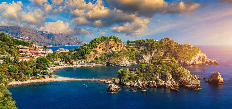 Aerial view of Isola Bella in Taormina, Sicily, Italy. Isola Bella is small island near Taormina, Sicily, Italy. Narrow path connects island to mainland Taormina beach in azure waters of Ionian Sea. 
