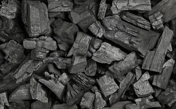 Background texture of many black charcoal pieces
