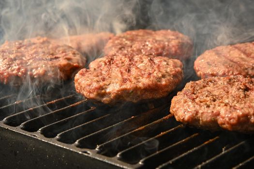 Beef burger for hamburger on barbecue grill