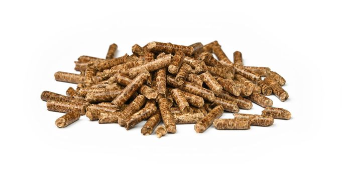 Heap of hardwood pellets for food smoking on white