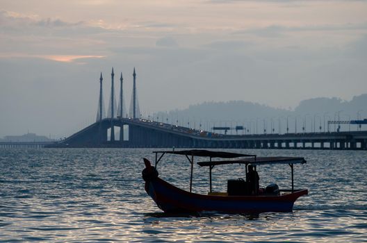 Fishing boat at Penang Bridge