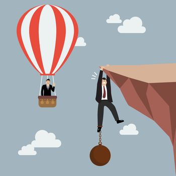 Businessman in hot air balloon fly pass businessman hold on the cliff with burden