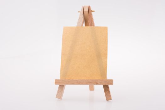 Brown color  notepaper on a painting tripod