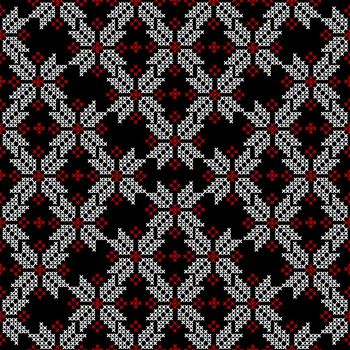 Embroidered cross-stitch seamless pattern with ethnic motifs