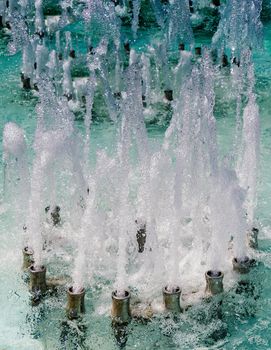 The fountains gushing sparkling water in a pool