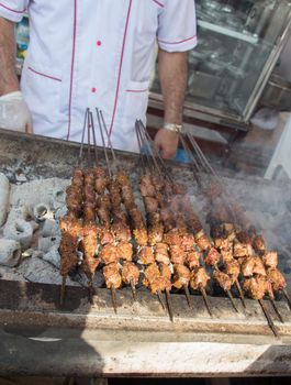 Turkish style meat shashlyk being grilled