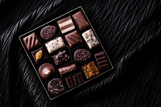 Swiss chocolates in gift box, various luxury pralines made of dark and milk organic chocolate in chocolaterie in Switzerland, sweet dessert food as holiday present and premium confectionery brand