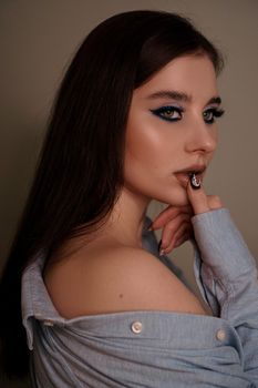 Beauty portrait with professional blue makeup. Fashion portrait