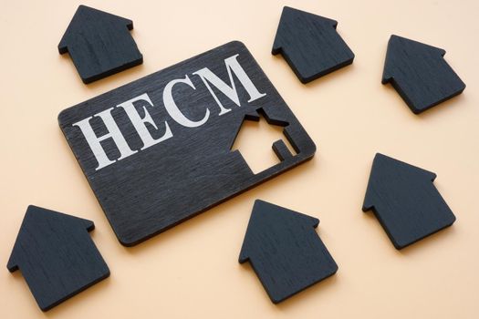 Home Equity Conversion Mortgage HECM sign on the dark plate.